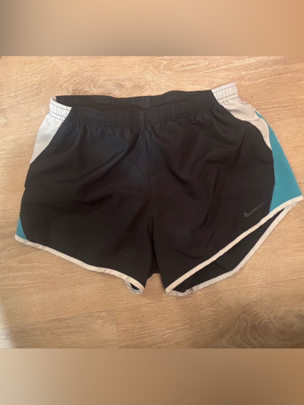 Nike running dark gray Athletic Shorts with Teal and White Trim